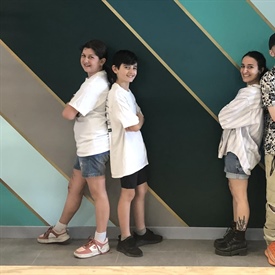 7th Grade NDA Students help paint mural