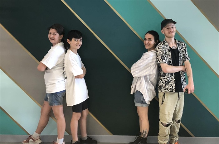 7th Grade NDA Students help paint mural